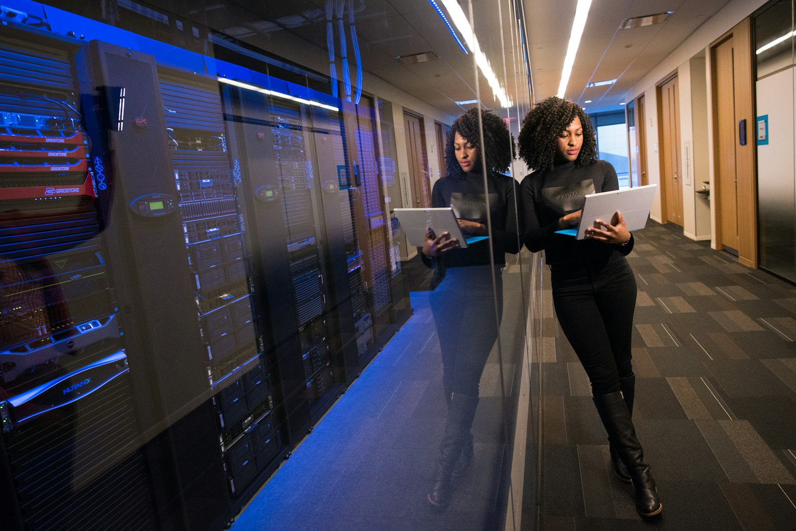 Engineer checking systems in a data room